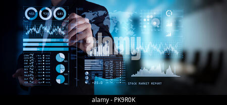Investor analyzing stock market report and financial dashboard with business intelligence (BI), with key performance indicators (KPI).businessman hand Stock Photo