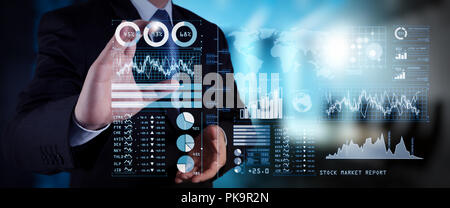 Investor analyzing stock market report and financial dashboard with business intelligence (BI), with key performance indicators (KPI).businessman hand Stock Photo