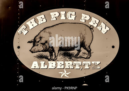Texas BBQ pig sign in small town Albert Stock Photo