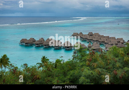Over the water bungalows at the Sofitel la Ora Beach Resort Moorea, Tahiti, French Polynesia Stock Photo