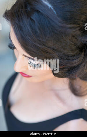Close up of a woman wearing face eyelashes Stock Photo