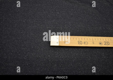 Fabric suit, tweed black-blue-beige from wool. Stock Photo