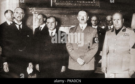 From left to right: Chamberlain, Daladier, Hitler, Mussolini, pictured in 1938 before signing the Munich Agreement which gave the Sudetenland to Germany.   Arthur Neville Chamberlain, 1869 –1940. British statesman of the Conservative Party and Prime Minister of the United Kingdom.  Édouard Daladier, 1884 – 1970. French radical  politician and the Prime Minister of France.  Adolf Hitler,1889 – 1945. German politician, demagogue, Pan-German revolutionary, leader of the Nazi Party, Chancellor of Germany, and Führer of Nazi Germany from 1934 to 1945.   Benito Amilcare Andrea Mussolini Stock Photo