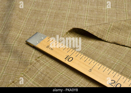 Fabric wool suit, cage beige green Stock Photo