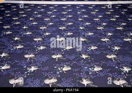 Silk twill fabric with a picture of cranes Stock Photo