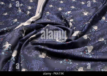 Silk twill fabric with a picture of cranes Stock Photo