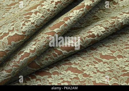 Cotton and polyamide, neoprene mesh, green lace Stock Photo
