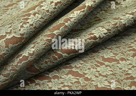 Cotton and polyamide, neoprene mesh, green lace Stock Photo
