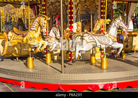 Old fashioned french carousel with horses Stock Photo