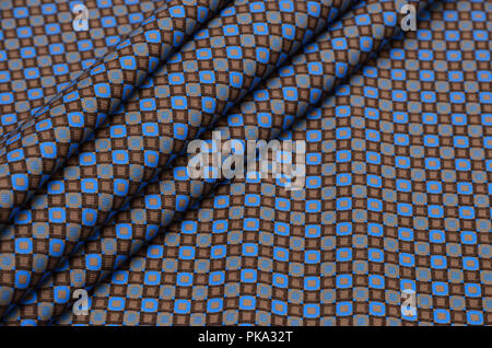 Cotton fabric in a brown - blue cage Stock Photo