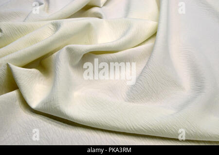 Cotton fabric with ivory ivory with ornament Stock Photo
