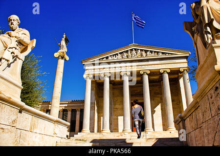 The statues of the ancient Greek philosopher Plato and Greek Goddess Athena outside of the Academy of Athens, Athens, Greece. Stock Photo