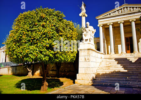 The statues of the ancient Greek philosopher Plato and Greek Goddess Athena outside of the Academy of Athens, Athens, Greece. Stock Photo