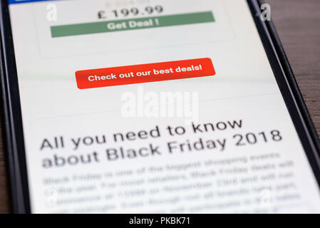 Check Out Best Deal button on shopping app on smartphone screen closeup. Stock Photo