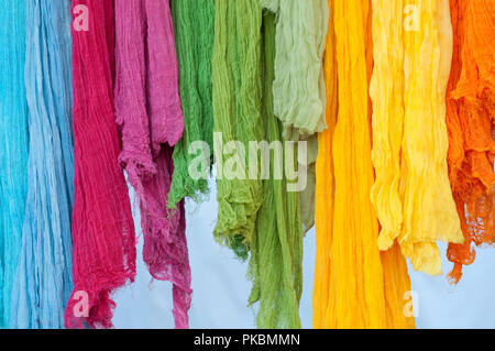 Colourful Scarves for Sale on Market Stall Stock Photo