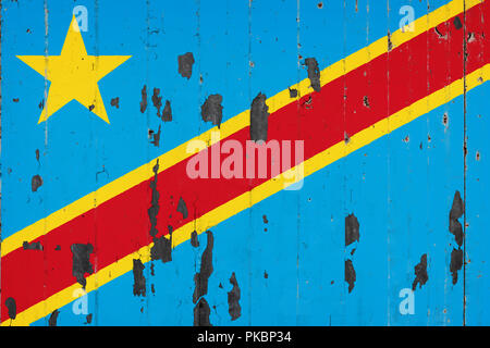 National flag of Democratic Republic of the Congo on the background of an old mettale covered with peeling paint Stock Photo