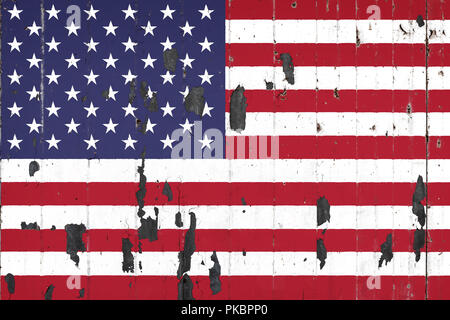 National flag of USA on the background of an old mettale covered with peeling paint Stock Photo