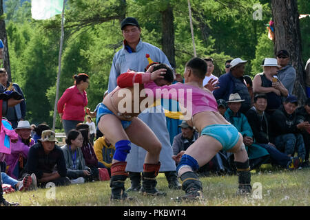 Mongolian wrestling competition near the Khovsgol Lake, Mongolia Stock Photo