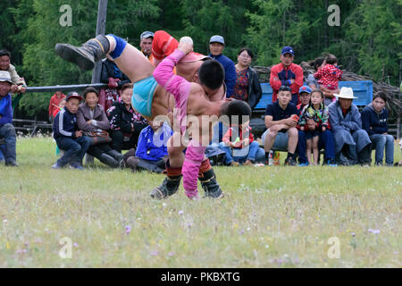 Mongolian wrestling competition near the Khovsgol Lake, Mongolia Stock Photo