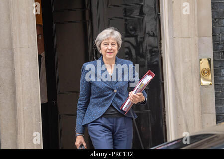 Prime Minister Theresa May (centre) with First Minister Arlene Foster ...