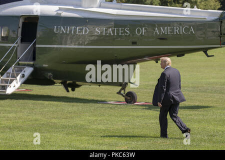 Washington, District of Columbia, USA. 6th Sep, 2018. United States President Donald J. Trump exits the West Wing of the White House as he departs the White House on September 6, 2018 in Washington, DC. Credit: Alex Edelman/CNP Credit: Alex Edelman/CNP/ZUMA Wire/Alamy Live News Stock Photo