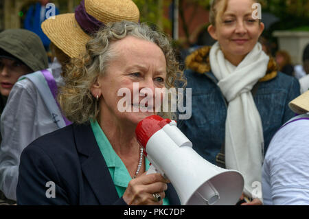 London, UK. 12th September 2018. Green Party voice in the House of Lords Jenny Jones, Baroness Jones of Moulsecoomb, speaks at the protest in Parliament Square by anti-fracking Nanas from Lancashire along with other campaigners from around the country calling on the government to stop ignoring science and the will of the people and ban fracking, which threatens the future of both the areas of country in which it is to take place though pollution and earthquakes and the future of the planet through its high level of carbon emissions. Credit: Peter Marshall/Alamy Live News Stock Photo