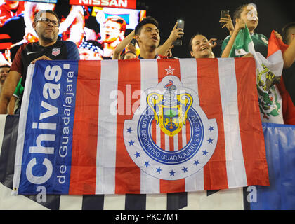 Nashville, TN, USA. 11th Sep, 2018. Mexico fans with a ''CHIVAS de GUADALJARA'' flag prior to the International Friendly match between Mexico and USA at Nissan Stadium in Nashville, TN. The US National team defeated Mexico, 1-0. Kevin Langley/CSM/Alamy Live News Stock Photo