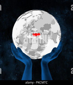 Turkey on translucent blue globe held in hands in space. 3D ...