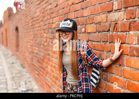 Stylish Young Hipster Girl Walks in the City and Drinking Coffee on the  Background of Cars Stock Image - Image of hipster, people: 85855901