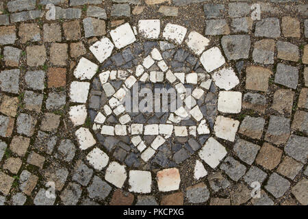 Star of David made from the cobblestones at the entrance to the Jewish Cemetery in Třebíč in Vysočina Region, Czech Republic.