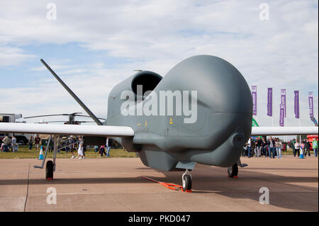 United States Air Force Northrop Grumman RQ-4B Global Hawk serial number 04-2015 which is an unmanned surveillance aircraft on display at an airshow. Stock Photo