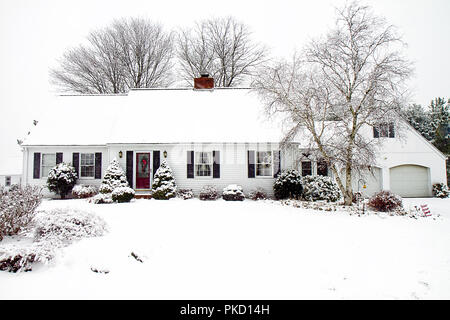 Cape Cod Home In The Midst Of Snow Storm Red Door With