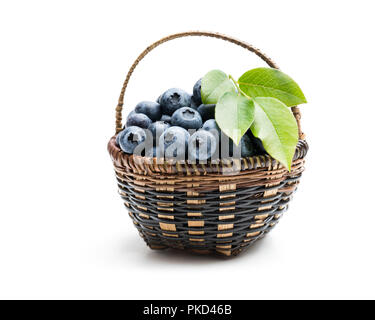 Fresh  blueberries in smal wicker basket isolated on white Stock Photo