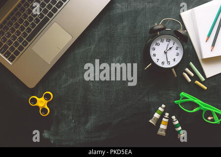 Back to school, top view flat lay concept with various educational accessories on blackboard Stock Photo