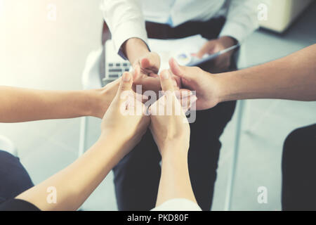 Group of Diverse Business People Hands Together Thump up of business people. Team Work Business Concept Stock Photo