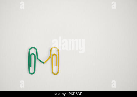 Concept Paperclips sign together on white background Stock Photo