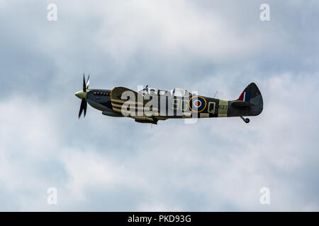 A rare two seater Spitfire, MJ627, in the colours of 441 squadron during a flying display over Biggin Hill Stock Photo