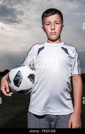 Boy-10-11 years old in football kit,Surrey,UK Stock Photo