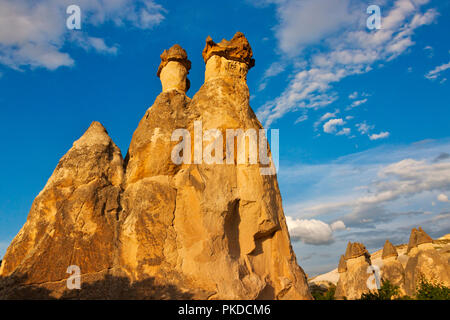 Fairy chimney rock formation in Goreme at sunset, Cappadocia (UNESCO World Heritage site), Turkey Stock Photo