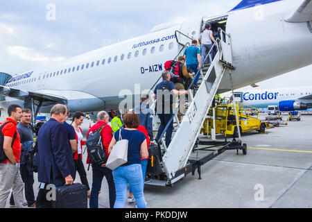Frankfurt, Germany - April 28, 2018: The people boarding the Lufthansa Airline aircraft. Stock Photo