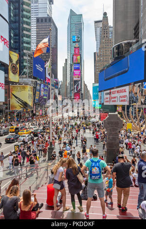 Visitors and tourists enjoying themselves at Times Square, 42nd Street ...