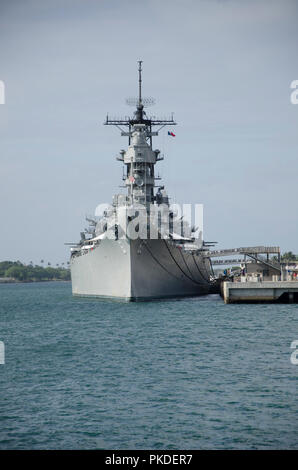 The USS Missouri (the ship on which the hostilities with Japan in WWII were officially ended) anchored in Pearl Harbor, Hawaii. December 2010. Stock Photo