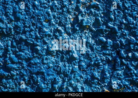 Close up of blue plastered  stone wall/grunge wall texture background Stock Photo