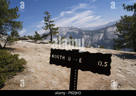 Sign on North Dome Hiking Trail in Yosemite National Park - Sierra Nevada Mountains, California Stock Photo