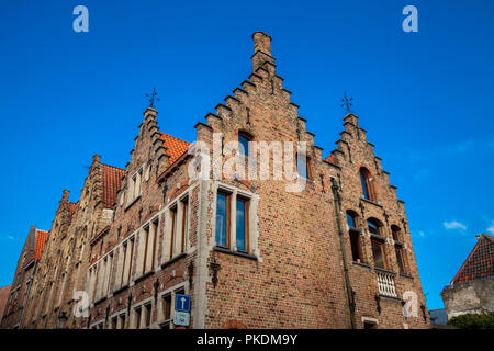 BRUGES, BELGIUM - MARCH, 2018: Houses representative of the traditional arquitecture of the historical Bruges town Stock Photo