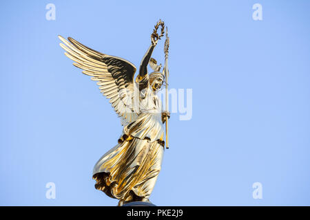 Berlin, Germany, September 05, 2018: Low Angle View of Golden Female Statue on Top of Victory Column Against Clear Sky Stock Photo