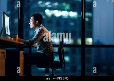 Business men in the office to work overtime Stock Photo