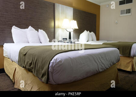 Standard double beds hotel room Stock Photo