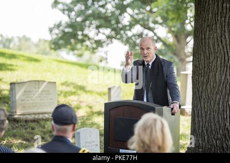 Chap. (Col.) Kenneth Sampson (ret.) gives remarks as the keynote speaker during a ceremony in honor of the 243rd U.S. Army Chaplain Corps Anniversary at Chaplains Hill in Section 2 of Arlington National Cemetery, Arlington, Virginia, July 27, 2018.  A wreath was laid at Chaplains Hill by Chaplain (Maj. Gen.) Paul K. Hurley, chief of chaplains, U.S. Army Chaplain Corps, and Sgt. Maj. Ralph Martinez, regimental sergeant major, U.S. Army Chaplain Corps. Stock Photo