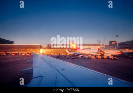 The airport ramp or apron of the Brussels National Airport (Belgium, 10/08/2012) Stock Photo